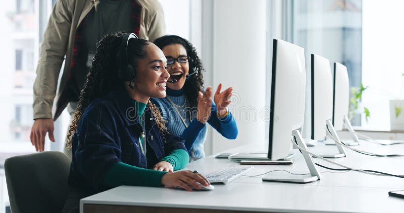 Call center support, computer and people with applause for target, sales processing and achievement. Headset royalty free stock image