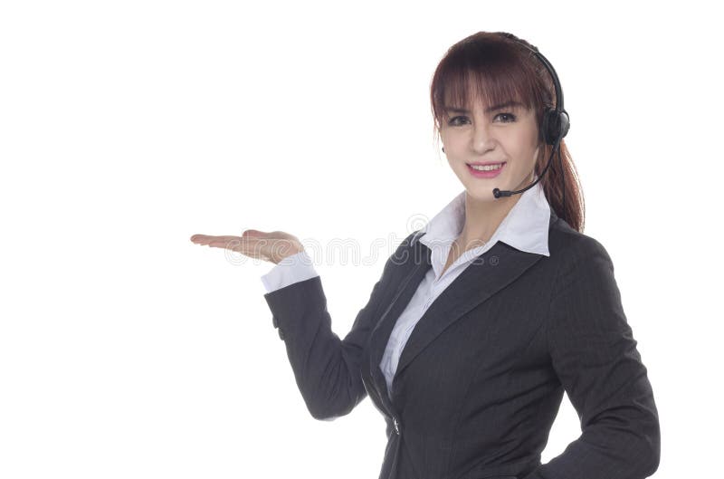 Call center woman with headset Studio shot. Smiling Business woman showing open hand palm isolated on a white background with cop