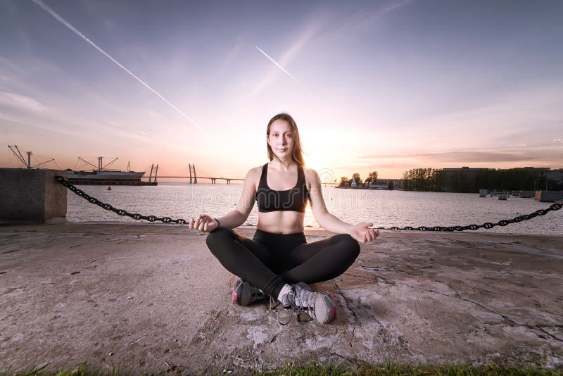 Calm of Athletic Asian Woman in Sportwear Practice Yoga Cat Cow