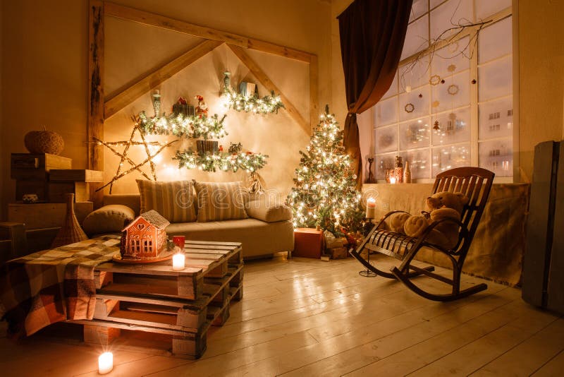 Calm image of interior modern home living room decorated christmas tree and gifts, sofa, table covered with blanket.