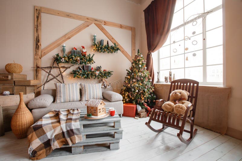 Calm image of interior modern home living room decorated christmas tree and gifts, sofa, table covered with blanket.