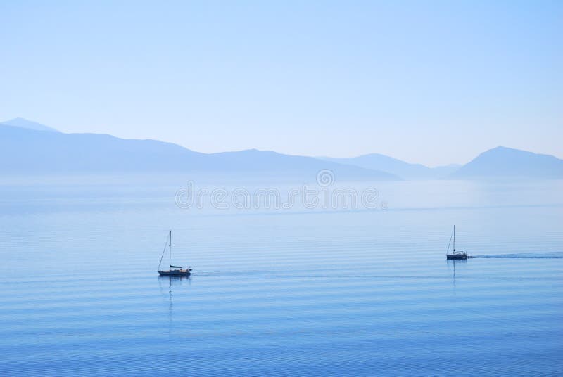 Calm ionian sea waters with sailing yachts