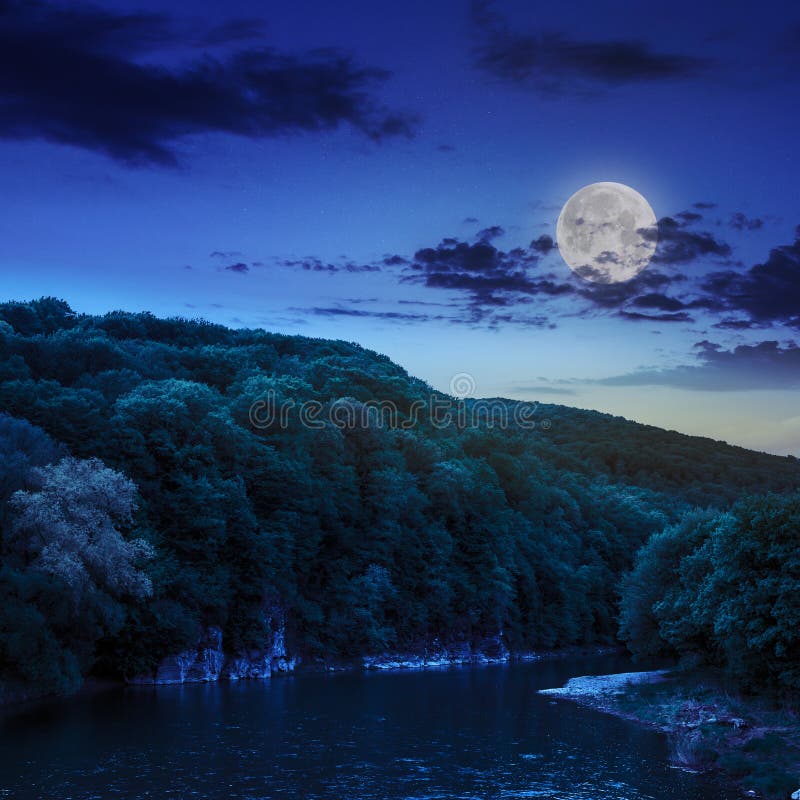 calm-mountain-river-dark-summer-night-flowing-green-mountains-moon-light-40204304.jpg