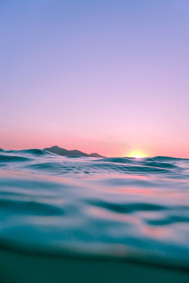 Calm ocean waters at twilight.