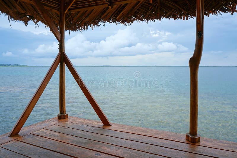 Calm sea from a palapa over water