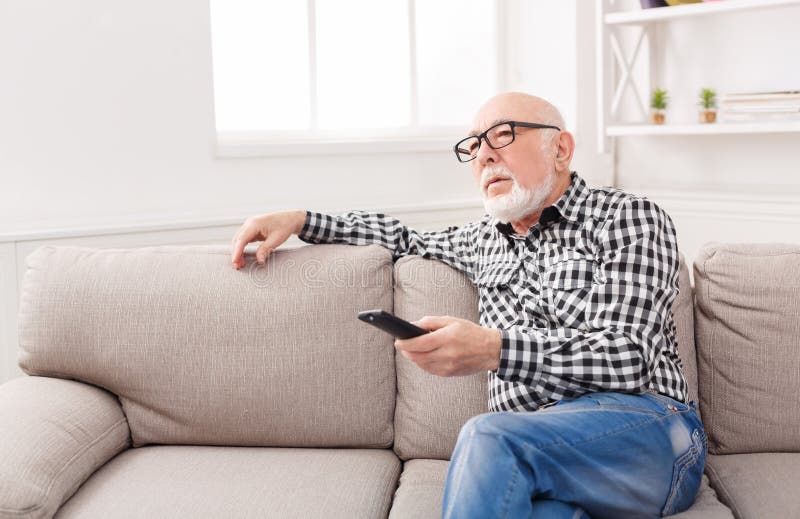 Mature man watching image photo