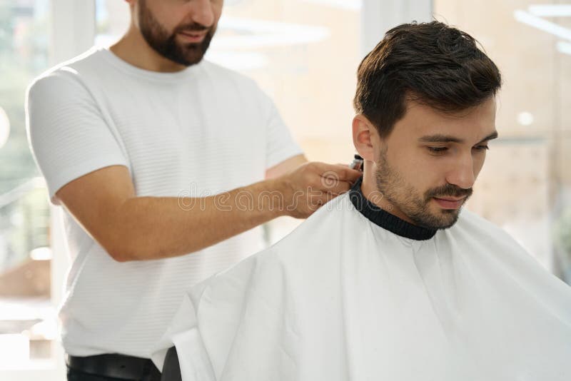 Customers In Local Barber Shop Stock Photo - Download Image Now