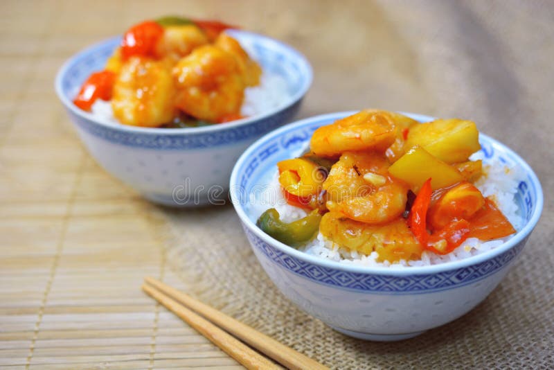 Sweet and sour shrimp. deep fried crispy prawn stir fried with pineapple and fresh capsicum in sour and sweet sauce. worldwide famous chinese cuisine. Sweet and sour shrimp. deep fried crispy prawn stir fried with pineapple and fresh capsicum in sour and sweet sauce. worldwide famous chinese cuisine.