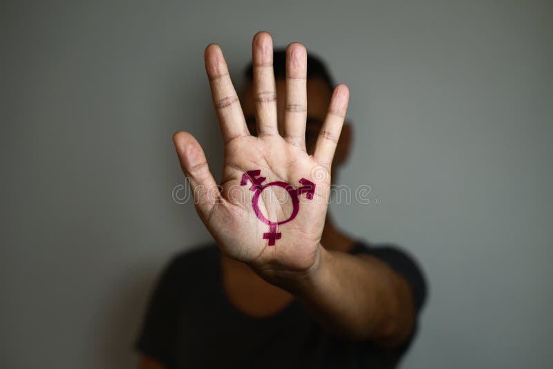Cambie de sexo el símbolo en la palma de la mano imágenes de archivo libres de regalías Cambie de sexo el símbolo en la palma de la mano imágenes de archivo libres de regalías