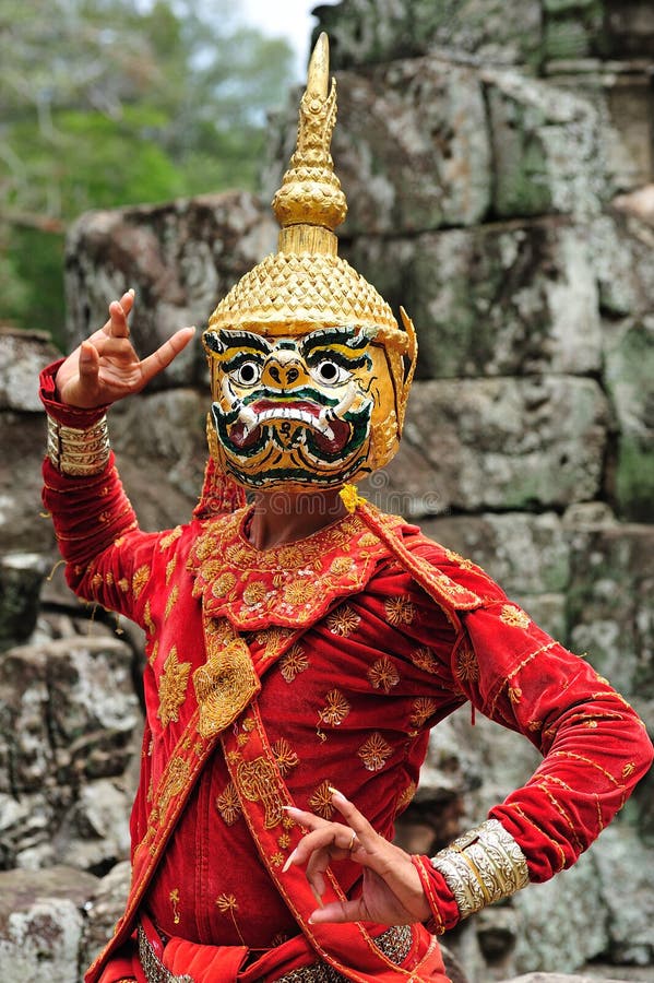 The bayon construction started probably arround 1200 AD during the reign of Jayavarman VII to Jayavarman VIII. Art historians considered that this temple is one of the most enigmatic religious construction in the world. here a khon mask man dancer, on the top terrace of the temple. The bayon construction started probably arround 1200 AD during the reign of Jayavarman VII to Jayavarman VIII. Art historians considered that this temple is one of the most enigmatic religious construction in the world. here a khon mask man dancer, on the top terrace of the temple