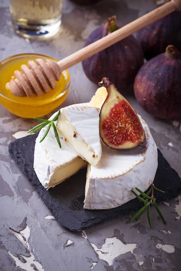 Camembert Cheese. Grilled Camembert Cheese With Olive Oil And Basil