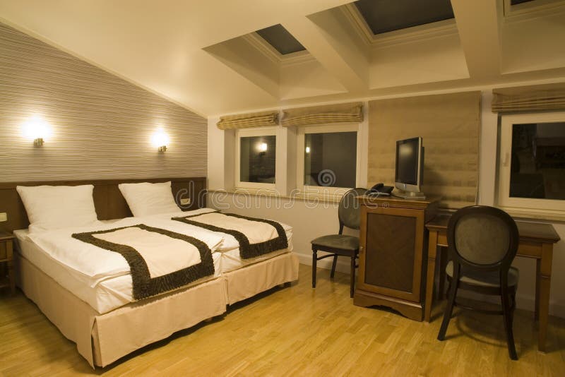 Camera da letto comoda dell'hotel