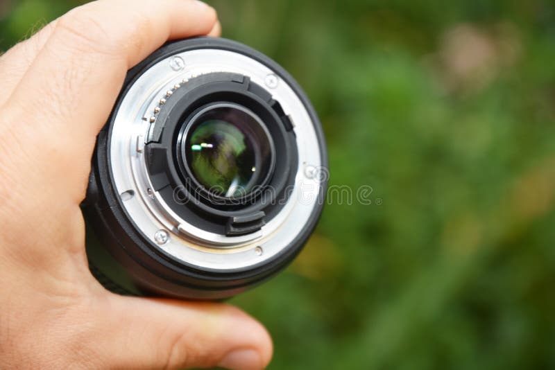 Camera Dust Inside Lens. Cleaning Dust on Your DSLR Camera Lens Stock