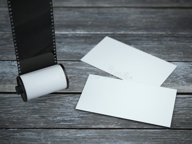 Camera film roll with two business cards royalty free stock photos Camera film roll with two business cards royalty free stock photos