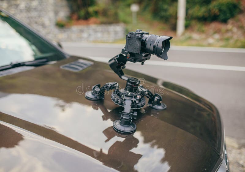 Camera Gimbal on the Car Steadicam Keeps on Suckers on the Auto Car