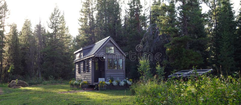 Warm summer evening outside a mountain off grid tiny house. Warm summer evening outside a mountain off grid tiny house.