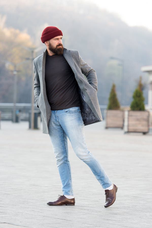 Refreshing Walk. Hipster Outfit and Hat Accessory. Stylish Casual