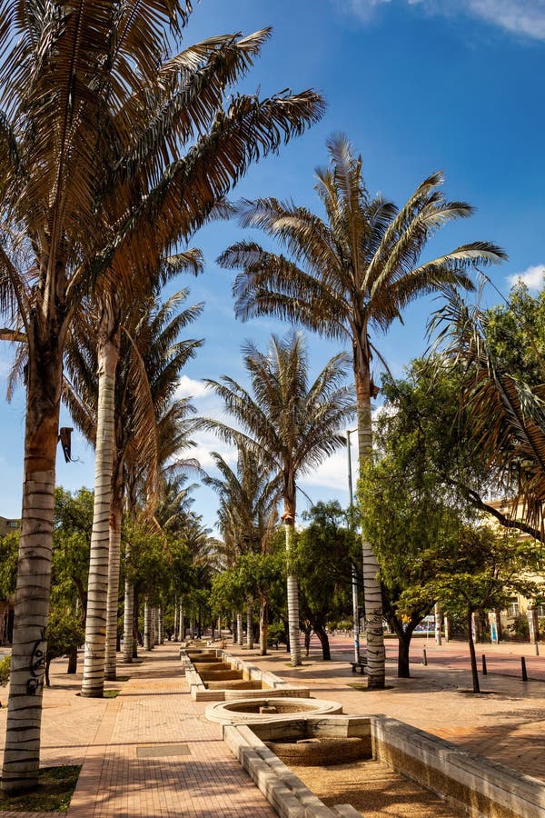 View of the walking path and fountains of the Eje Ambiental in Bogota city center. View of the walking path and fountains of the Eje Ambiental in Bogota city center