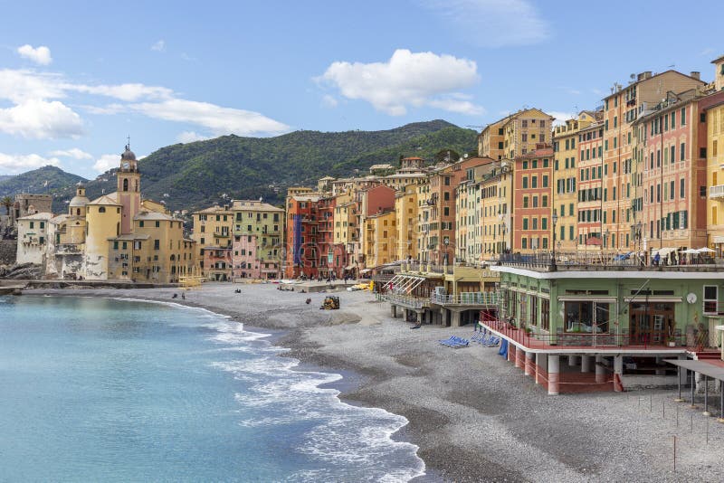 Beach and colored houses at Camogli. Liguria. Italy. Camogli Italy. 04-29-2019. Beach and colored houses at Camogli. Liguria. Italy stock photos Beach and colored houses at Camogli. Liguria. Italy. Camogli Italy. 04-29-2019. Beach and colored houses at Camogli. Liguria. Italy stock photos