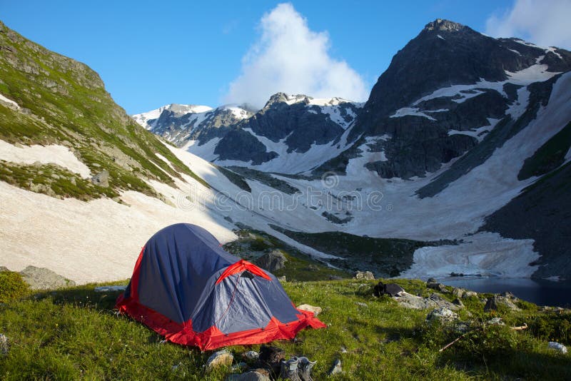 Camp wih tent in the mountains