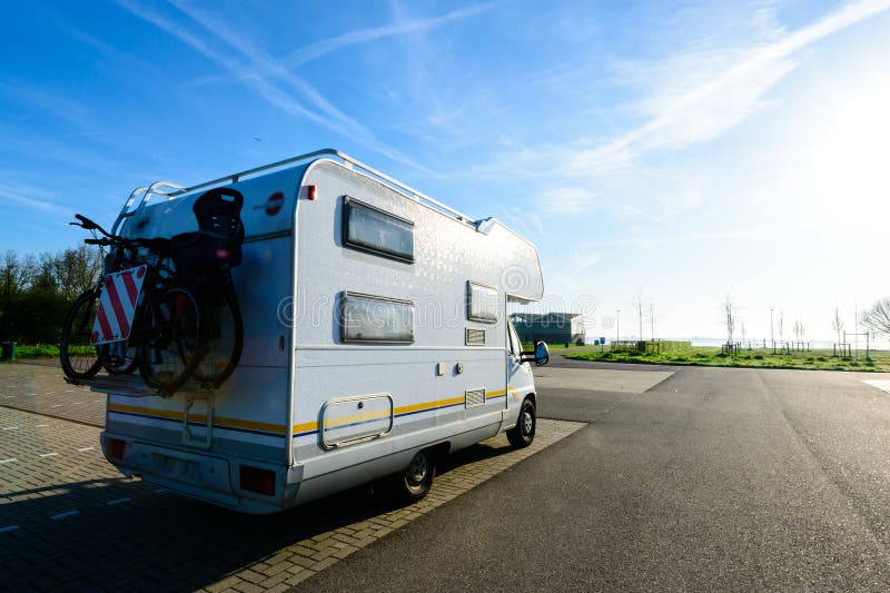 Camping car. Recreational vehicle motor home trailer on the road on sunny day. Camping car. Recreational vehicle motor home trailer on the road on sunny day