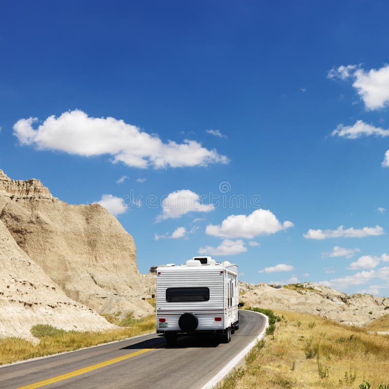 Camper on scenic road. royalty free stock image