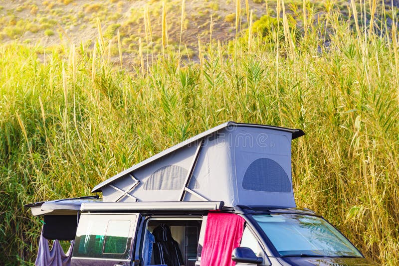 Camper Van with Roof Top Tent Camp on Nature Stock Image Image of