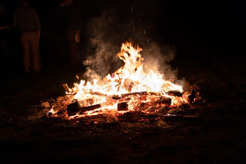Campfire on dark background centered stock photos