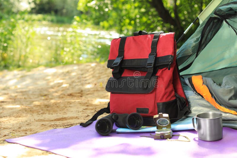 Camping Equipment and Modern Tent in Wilderness Stock Image Image of