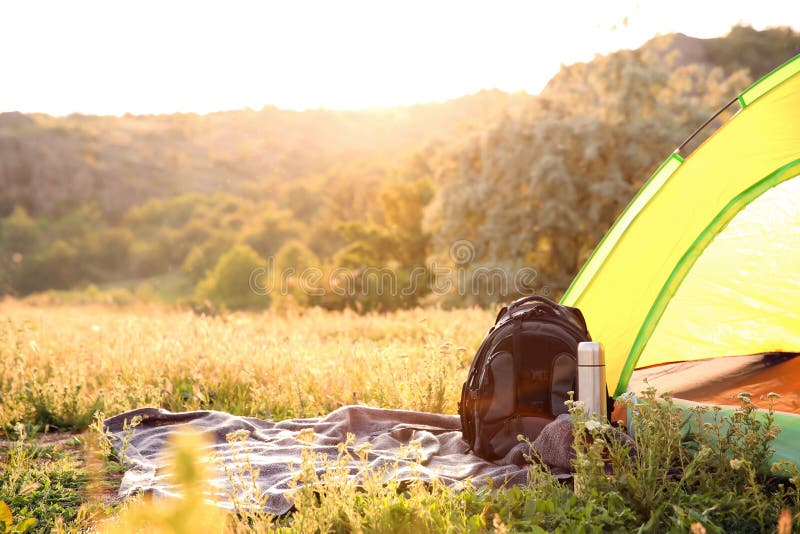 Camping gear and tourist tent in wilderness royalty free stock photos Camping gear and tourist tent in wilderness royalty free stock photos