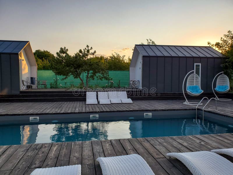 Camping in the glamping by the pool in the evening at sunset, without people