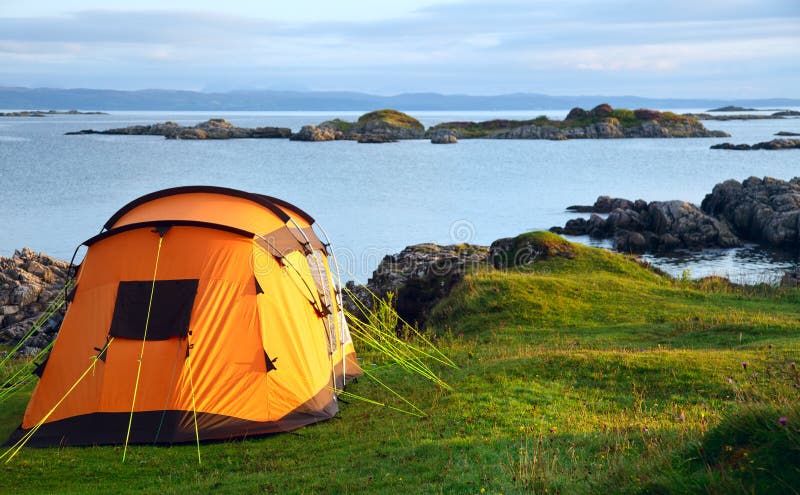 Camping tent on ocean shore