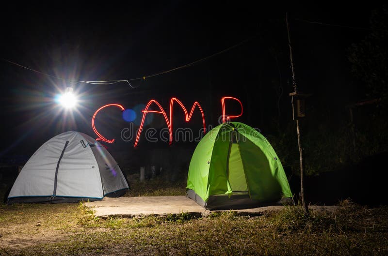 Camping Tents at Night in Forests with White Bulb Radiating Beams Stock Photo Image of extreme