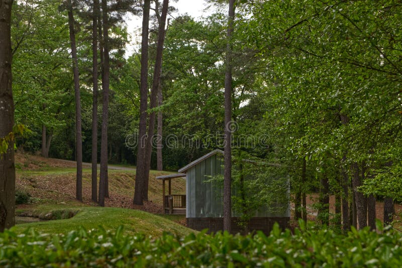 A camping vintage cabin in the forest distant view stock images