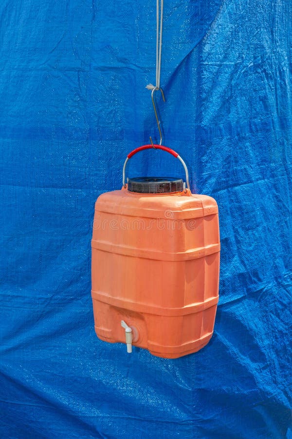 Camping Water Dispenser stock photo. Image of dispenser 209533594