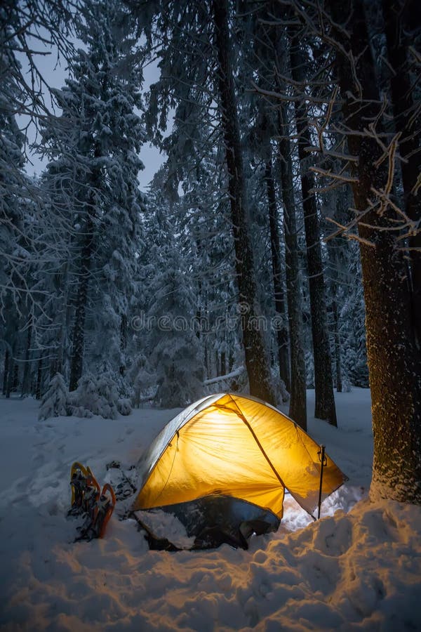 Camping during winter hiking in Carpathian mountains royalty free stock image