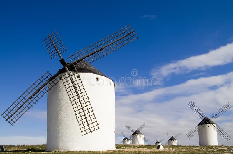 Medieval windmills dating from the 16th century overlooking the town of Campo de Criptana in Ciudad Real province, Castilla La Mancha, central Spain. Made famous in Miguel de Cervantes Saavedra's novel Don Quijote de la Mancha, these windmills are situated about 150km south of Madrid. Medieval windmills dating from the 16th century overlooking the town of Campo de Criptana in Ciudad Real province, Castilla La Mancha, central Spain. Made famous in Miguel de Cervantes Saavedra's novel Don Quijote de la Mancha, these windmills are situated about 150km south of Madrid