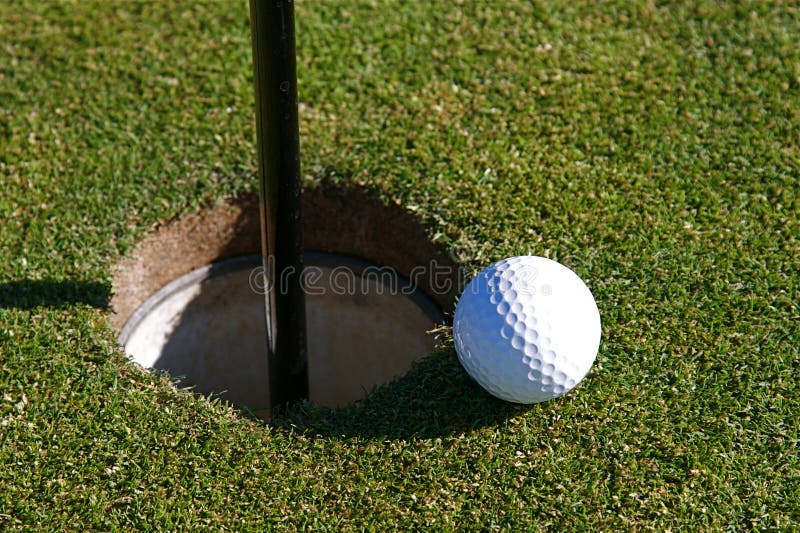 Golf Ball in the Hole. Golf Ball in the Hole