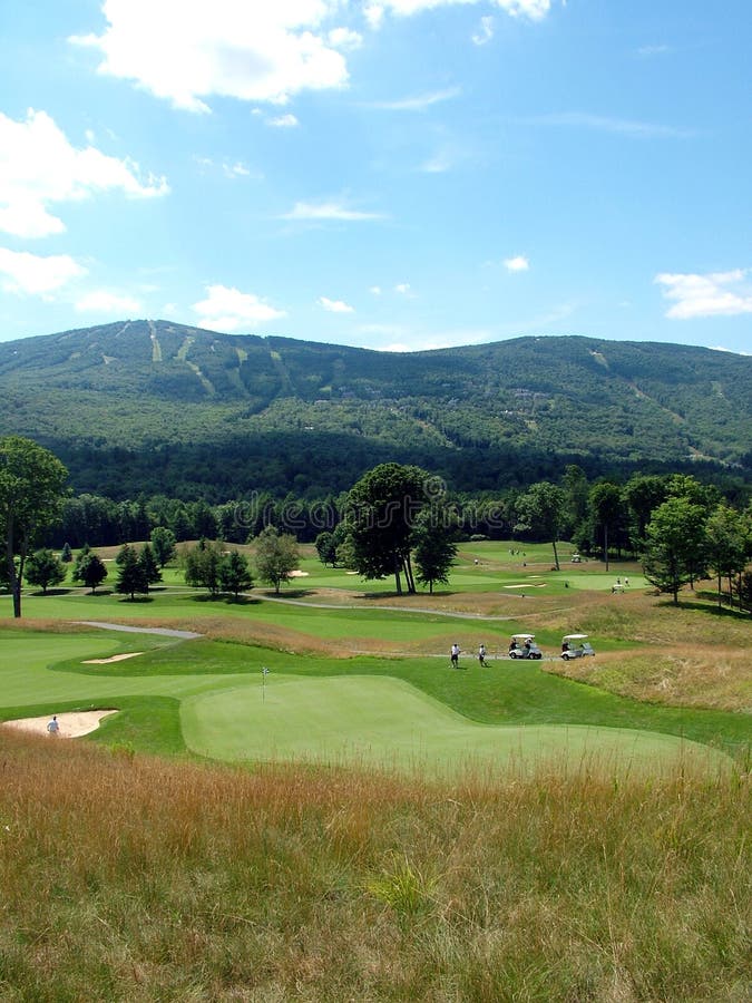 A beautiful golf course is located in the mountains of Vermont. A beautiful golf course is located in the mountains of Vermont.