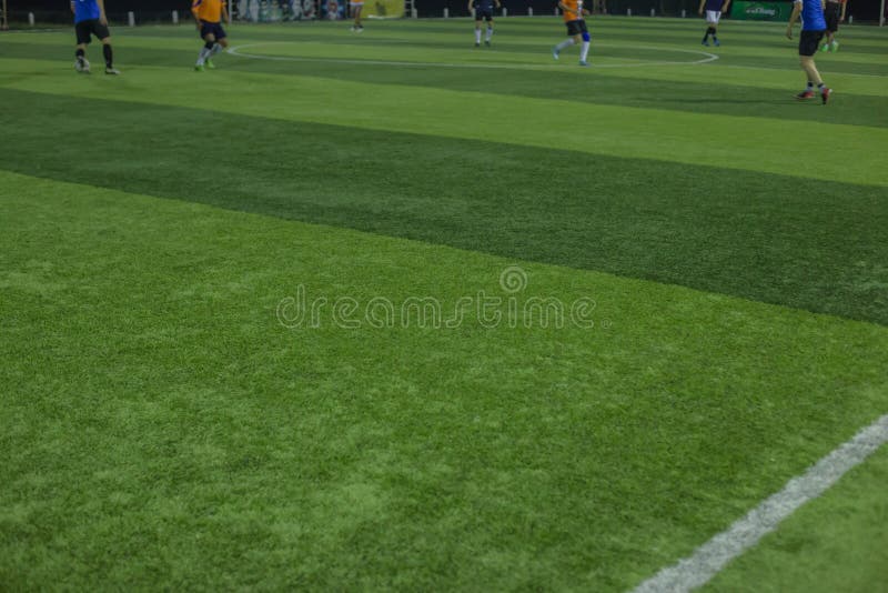 Campo di football americano artificiale dell'erba di sport immagini stock Campo di football americano artificiale dell'erba di sport immagini stock