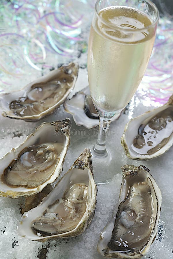 Champanhe e ostras fotos de stock