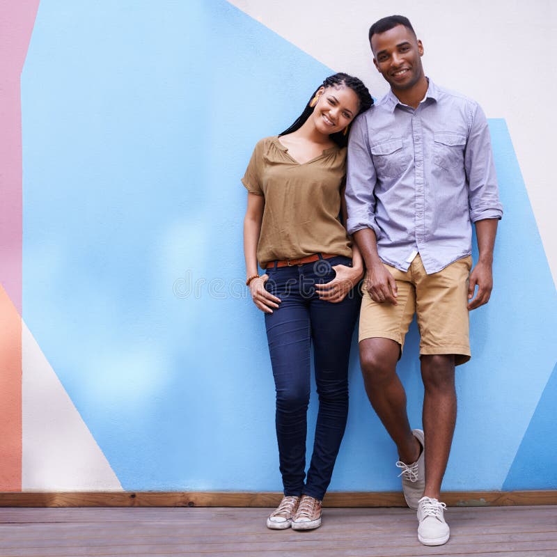 Young couple in love outdoor.Stunning sensual outdoor portrait of young  stylish fashion couple posing in summer in field Stock Photo by ©helenaak14  95149600