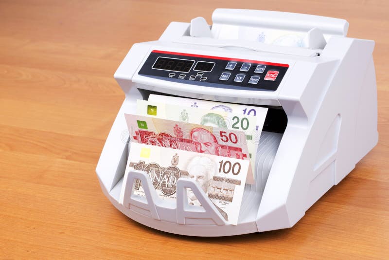 Canadian Dollars in a Counting Machine Stock Photo Image of register