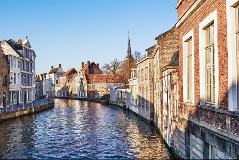 Pretty canal scene with beautiful architecture in Bruges Belgium. Pretty canal scene with beautiful architecture in Bruges Belgium.