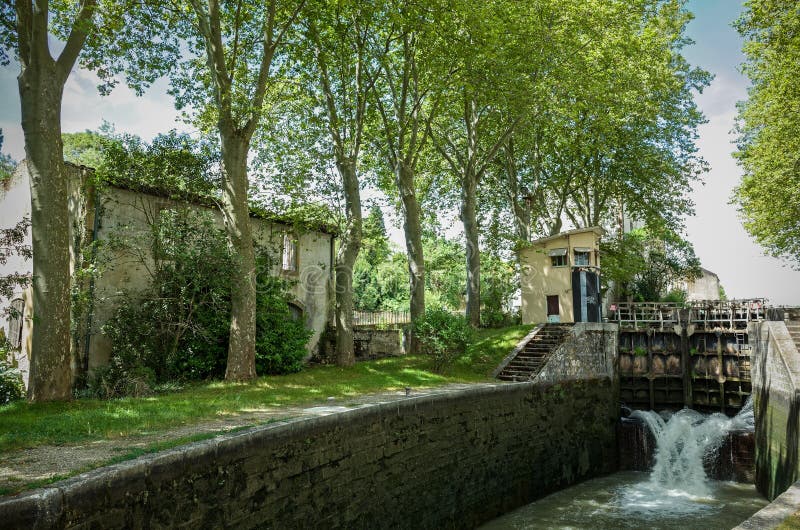 Lock and bridge on the Canal du Midi in Castelnaudary, Languedoc-Rousillon, France. Lock and bridge on the Canal du Midi in Castelnaudary, Languedoc-Rousillon, France.