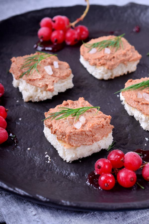 Canape with Foie Gras on the Black Plate Stock Photo Image of