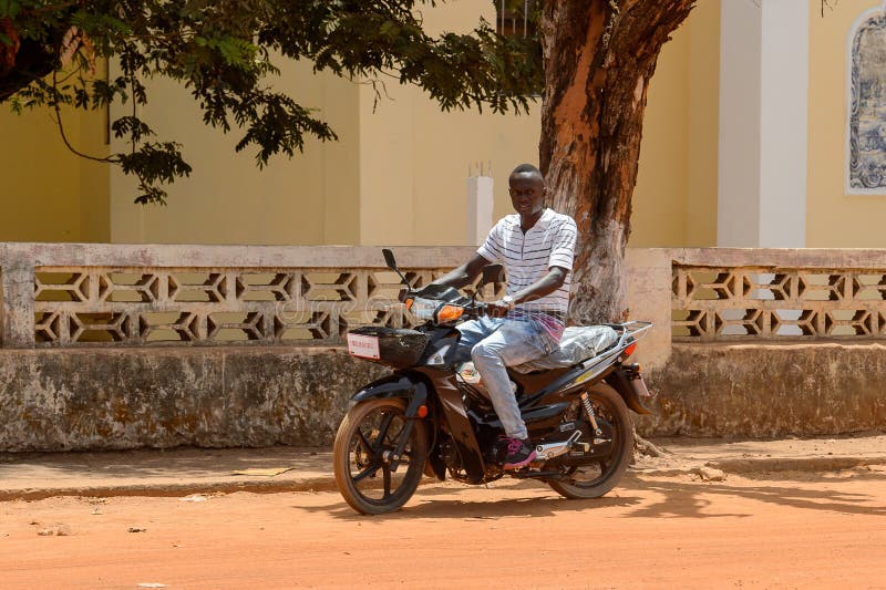 Unidentified Local Man Rides a Motorcycle in the Centre of Canc ...
