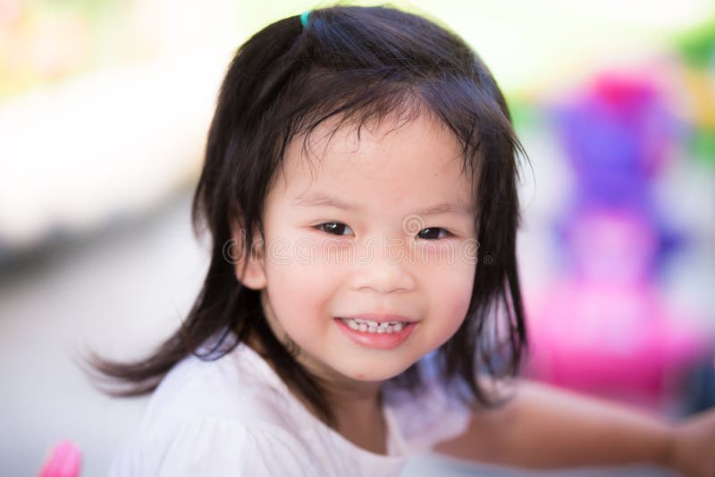 Happy Asian Child Girl Walking on the Street. Children Wear Colorful ...