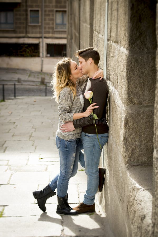 https://thumbs.dreamstime.com/b/candid-portrait-beautiful-european-couple-rose-love-kissing-street-alley-celebrating-valentines-day-passion-49640365.jpg