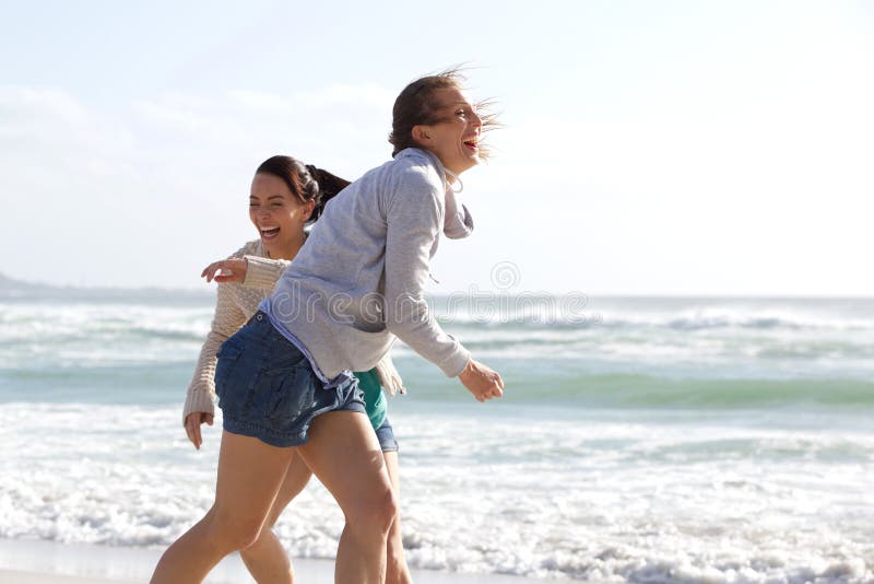 Candid Women Laughing at the Beach Stock Photo - Image of lifestyle ...